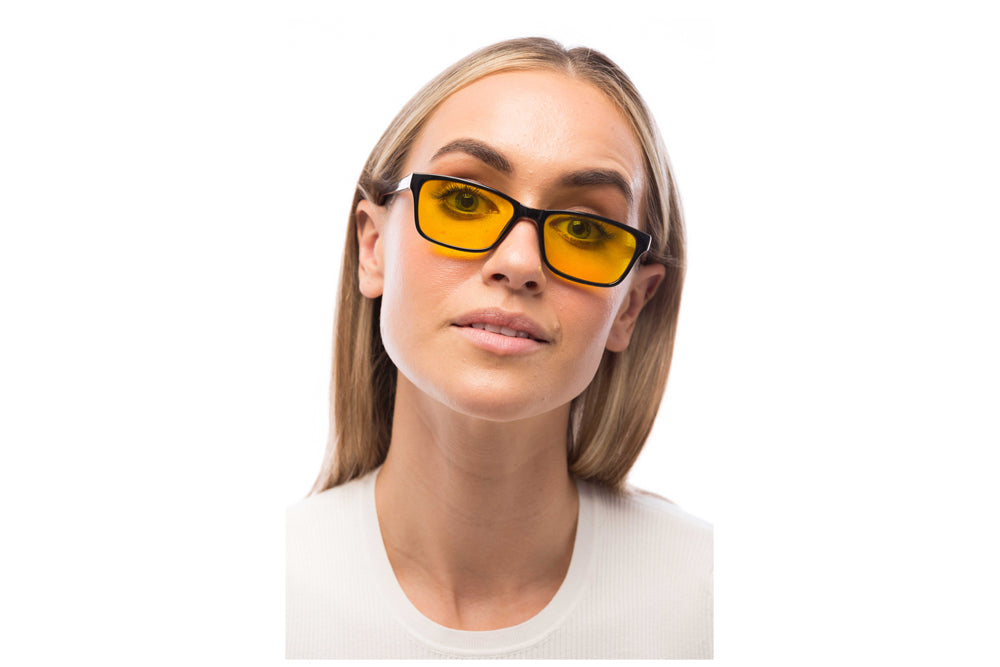 Woman Wearing Denver Light Sensitivity Glasses Readers